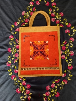 Alpona design on jute lunch box bag. Size 14*12