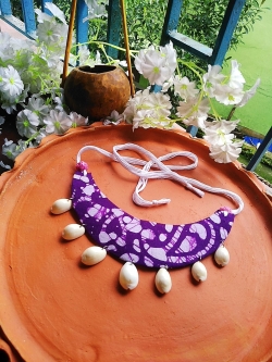 BLUE CHOKER WITH COWRIE DESIGN